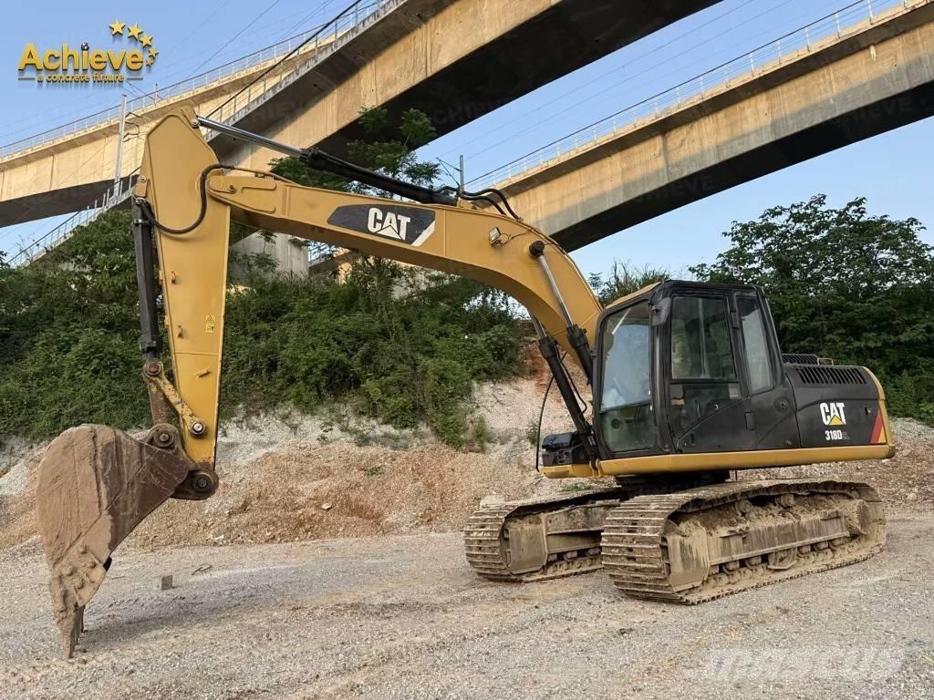 CAT 318DL حفارات زحافة