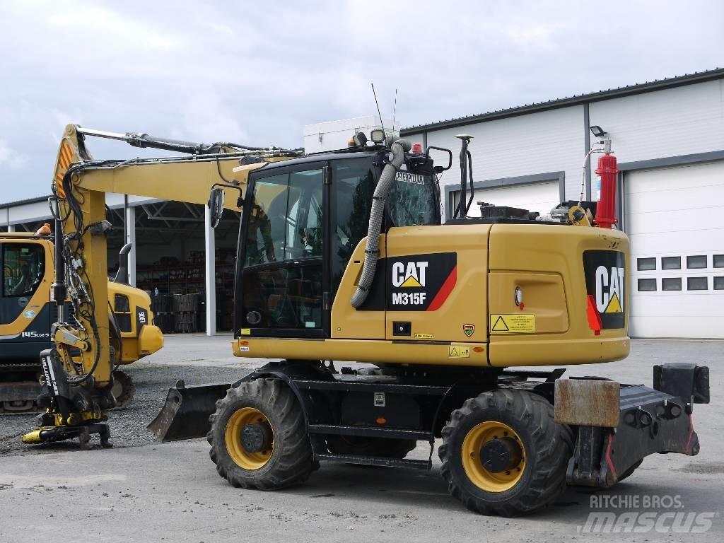 CAT M 315 F حفارات بعجل