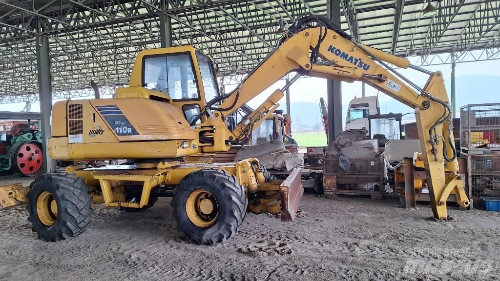 Komatsu PW 110 حفارات بعجل