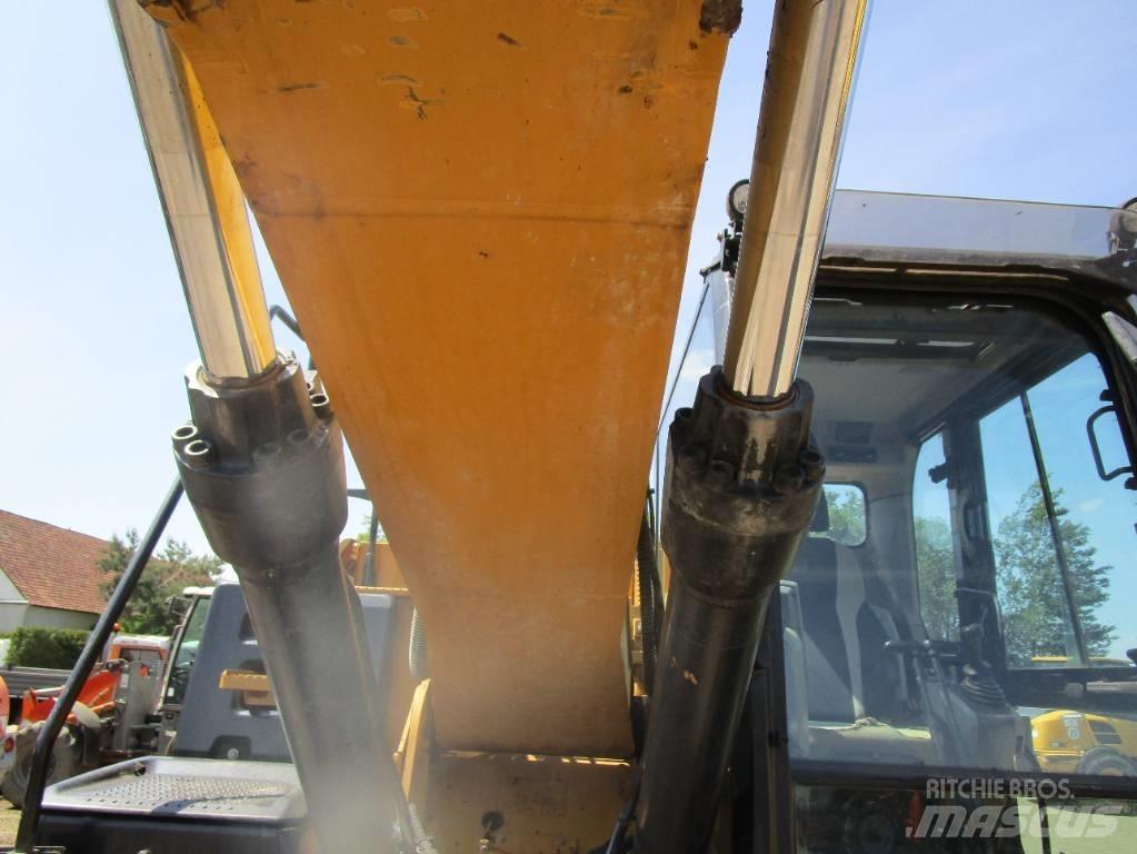 CAT 318 E L حفارات زحافة
