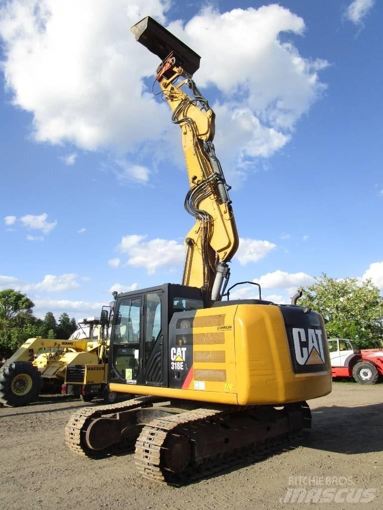 CAT 318 E L حفارات زحافة