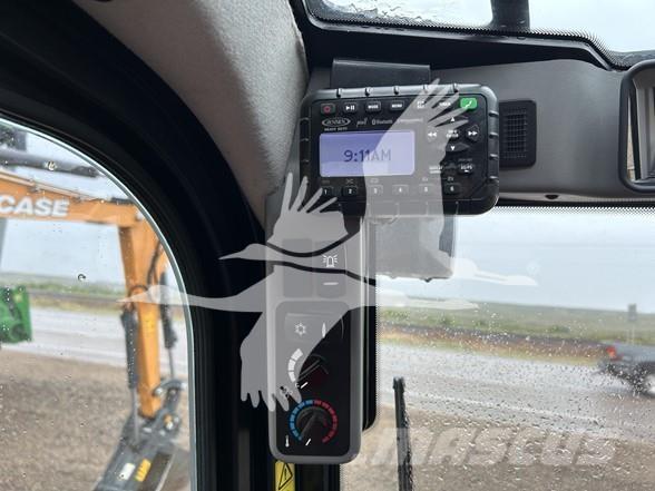 JCB 215 لوادر انزلاقية التوجيه