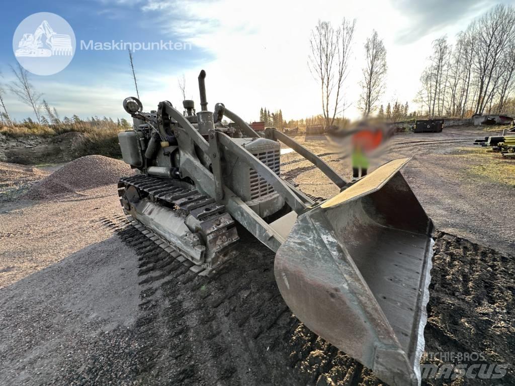 CAT 955 لوادر زحافة
