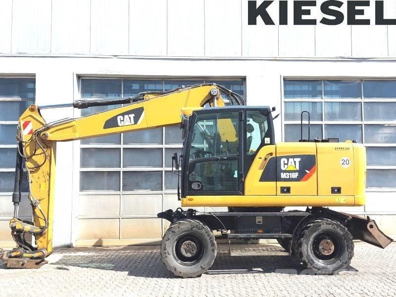CAT M 316 F حفارات بعجل