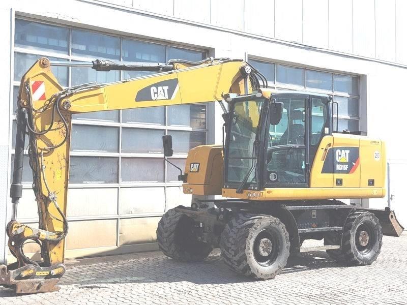 CAT M 316 F حفارات بعجل