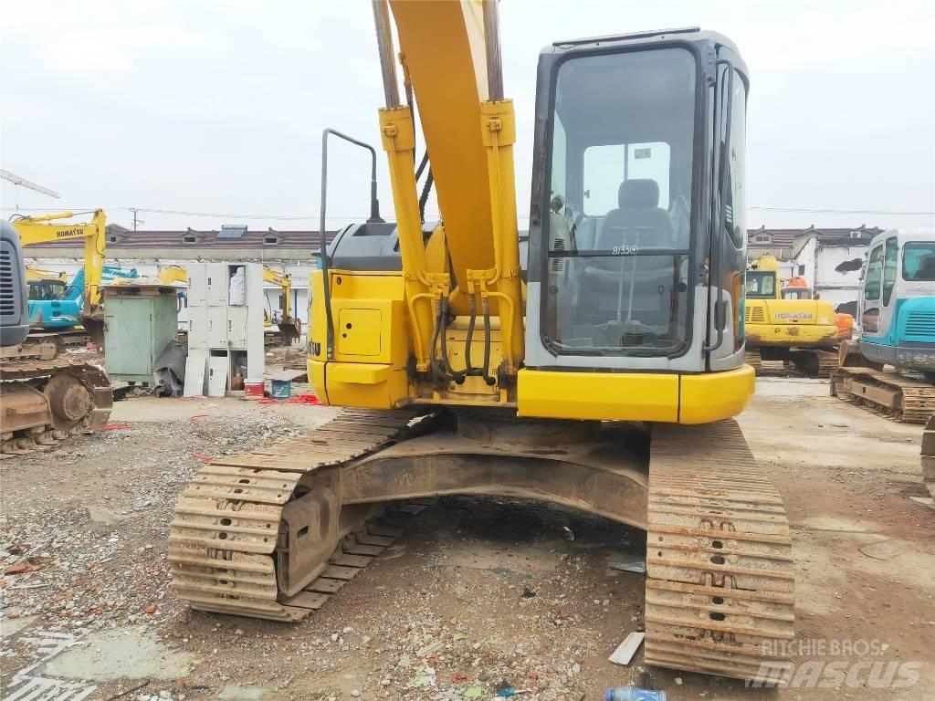 Komatsu PC 128 US حفارات وسط 7 طن - 12 طن