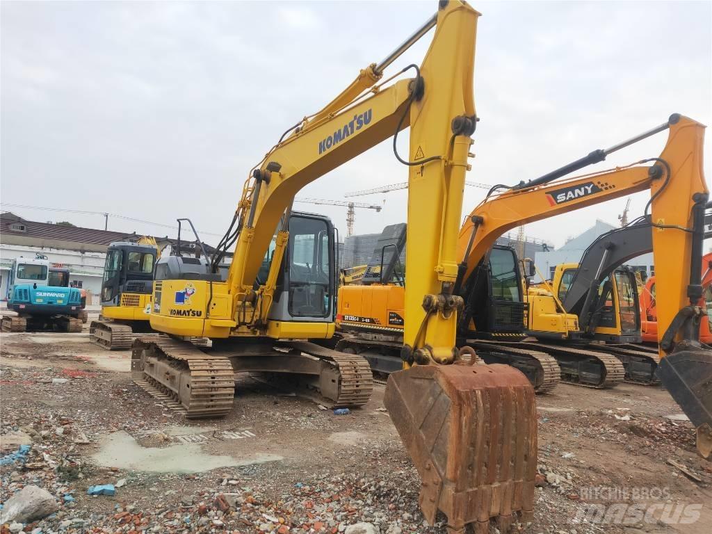 Komatsu PC 128 US حفارات وسط 7 طن - 12 طن