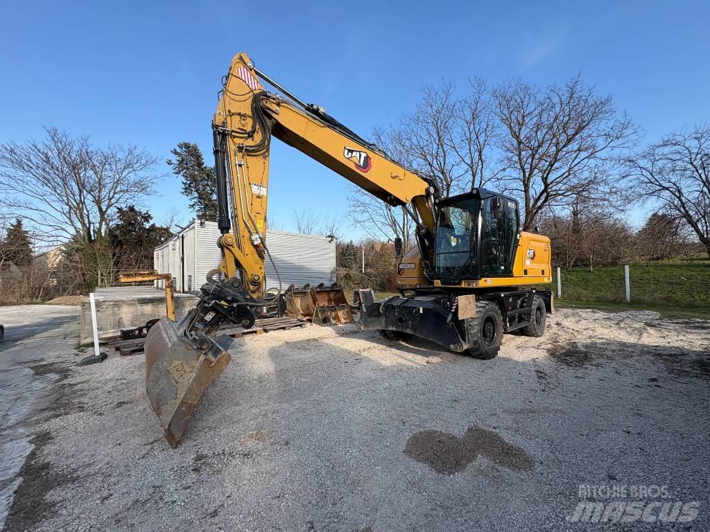 CAT M 318 حفارات بعجل