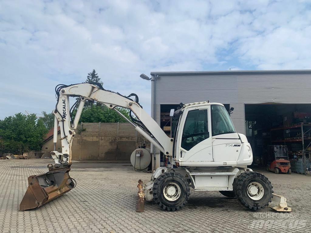 Mecalac 714 MW حفارات بعجل