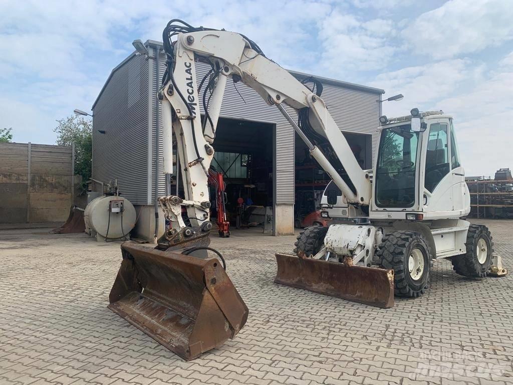 Mecalac 714 MW حفارات بعجل