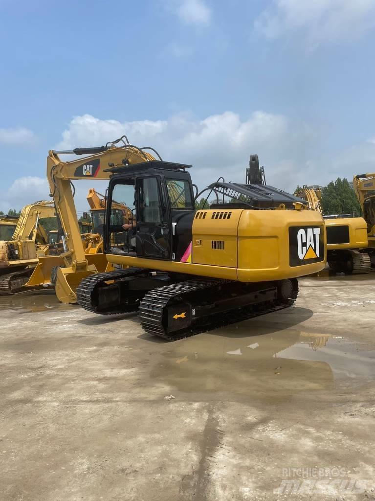 CAT 320D حفارات زحافة