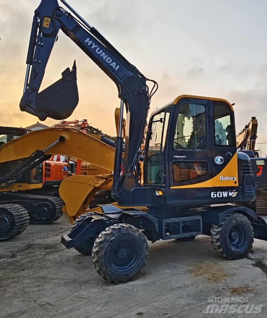 Hyundai 60 W حفارات بعجل