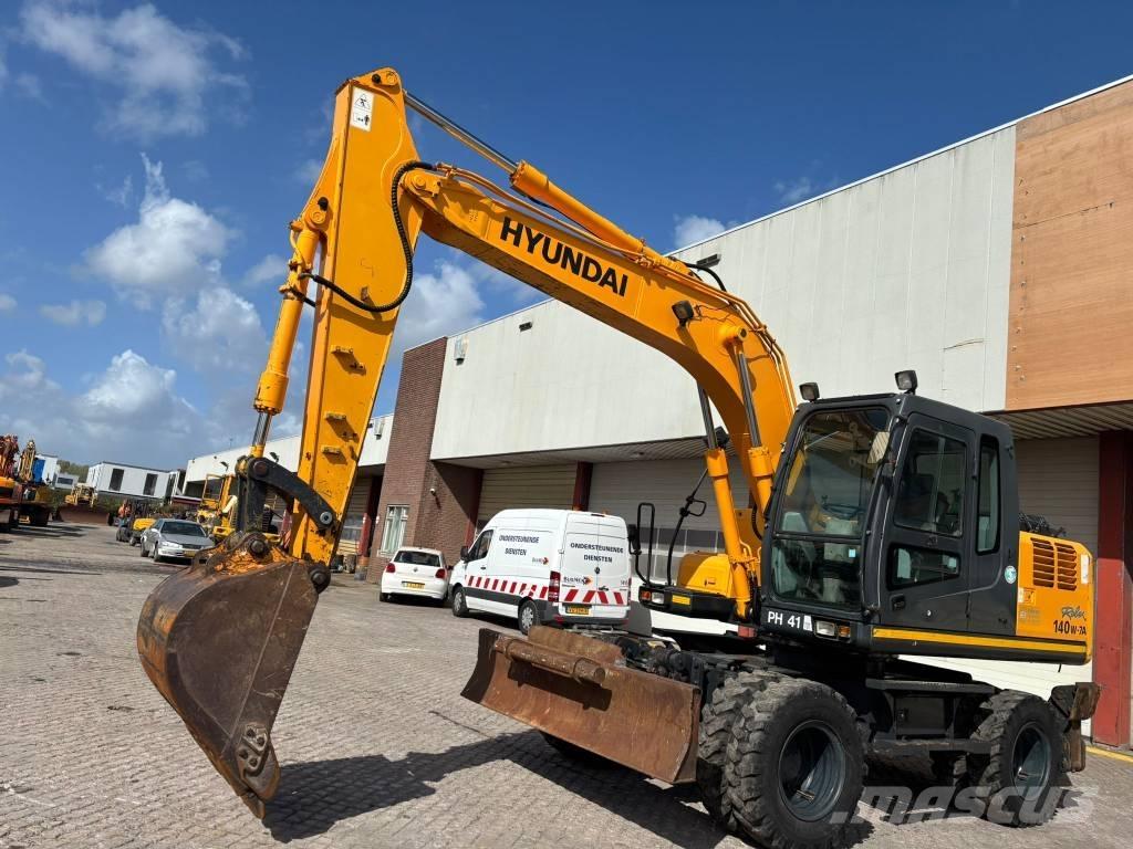 Hyundai 140W-7A حفارات بعجل