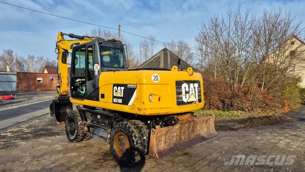 CAT M 316 D حفارات بعجل