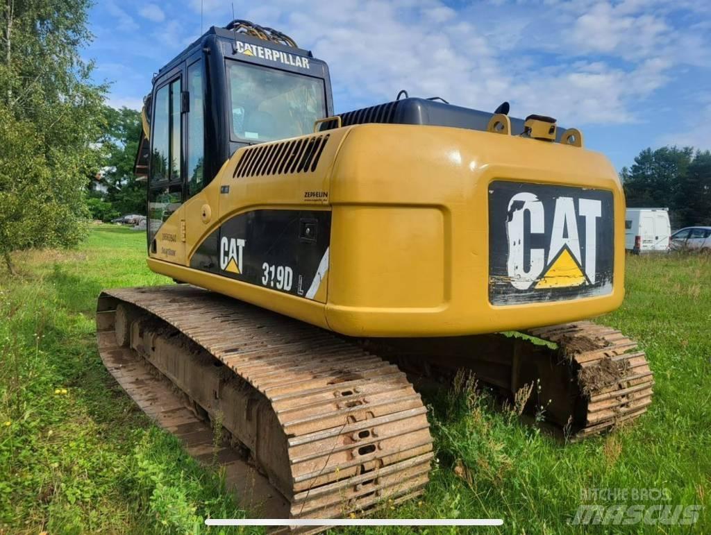 CAT 319 حفارات زحافة