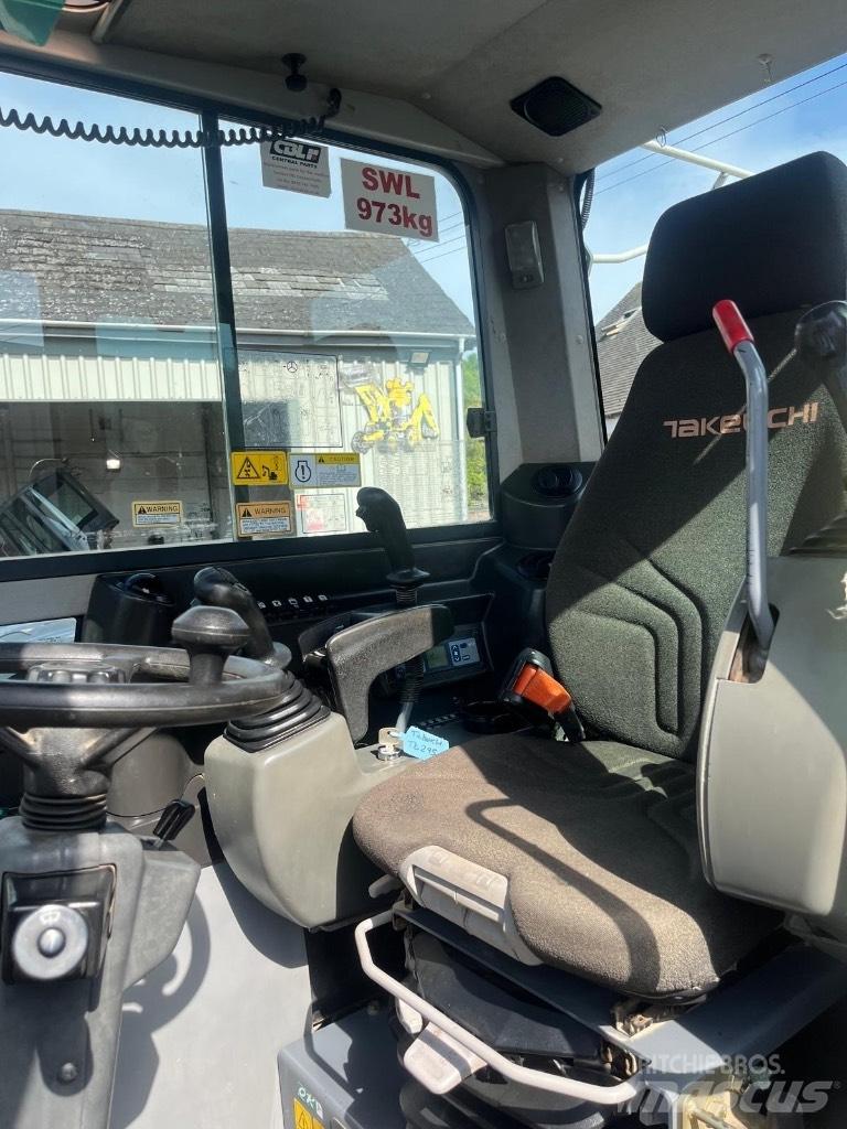 Takeuchi TB 295 W حفارات بعجل