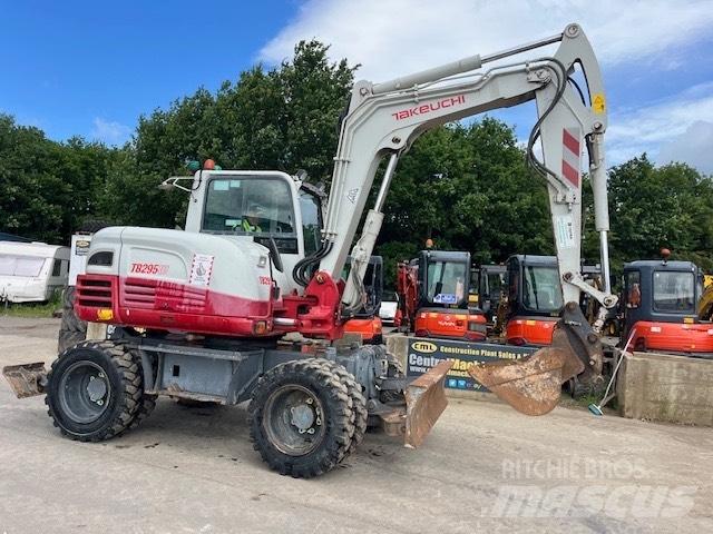 Takeuchi TB 295 W حفارات بعجل