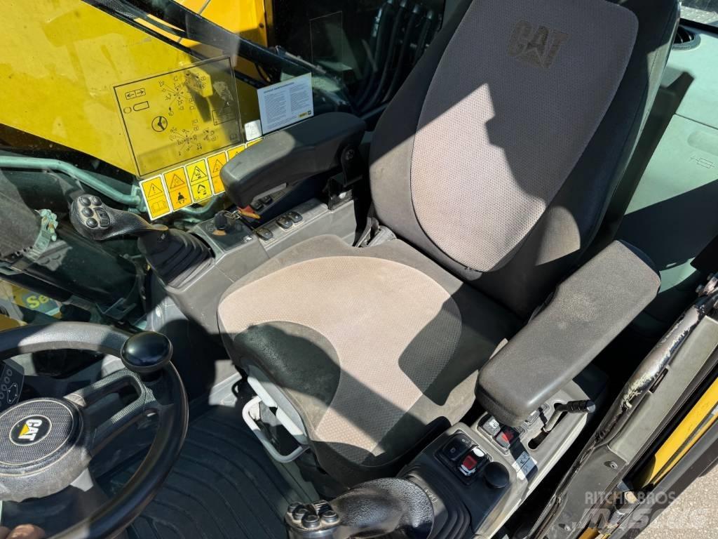 CAT M 315 F حفارات بعجل
