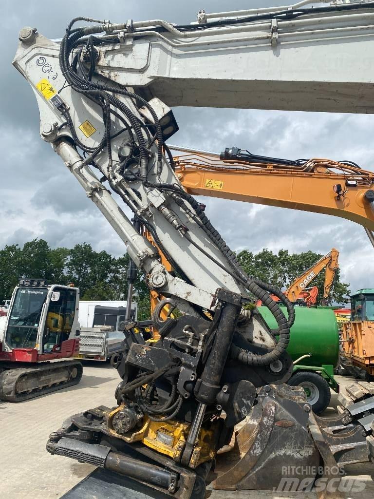 Takeuchi TB 2150 R حفارات زحافة