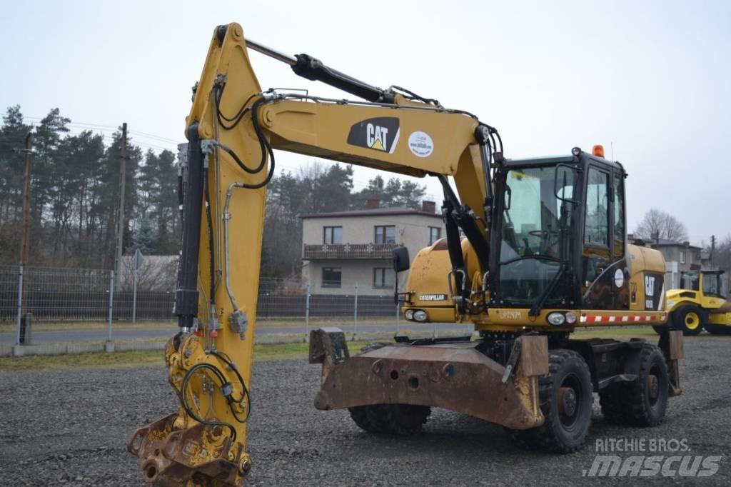 CAT M 315 D حفارات بعجل