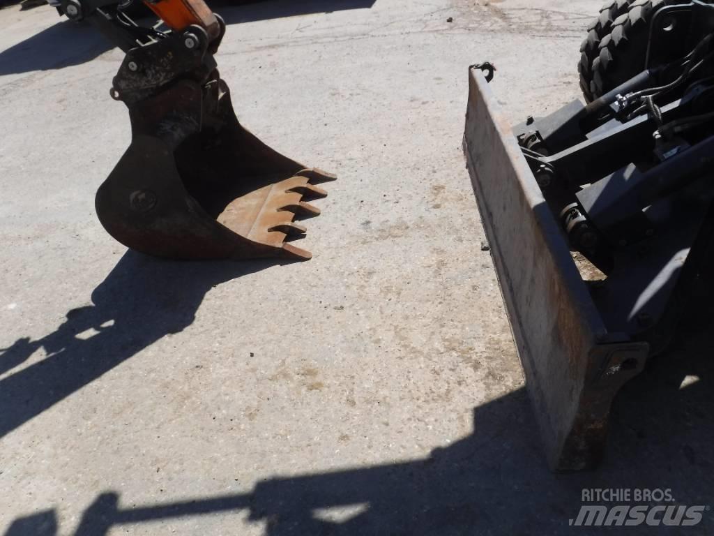 Doosan DX 100W-7 حفارات بعجل