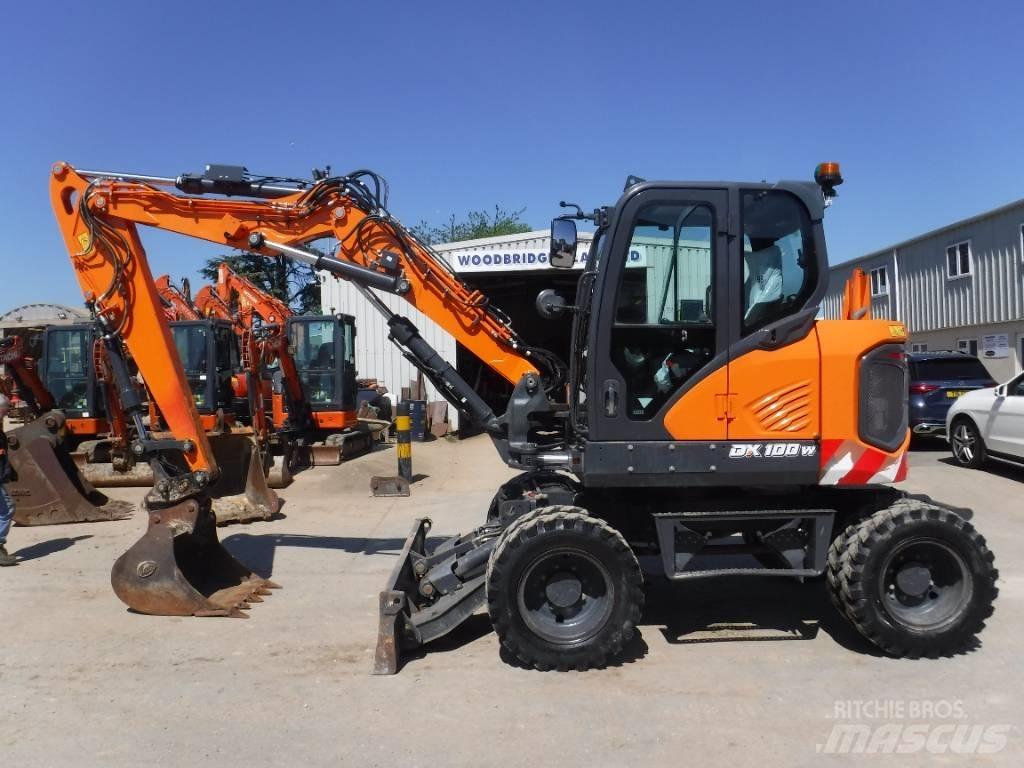 Doosan DX 100W-7 حفارات بعجل