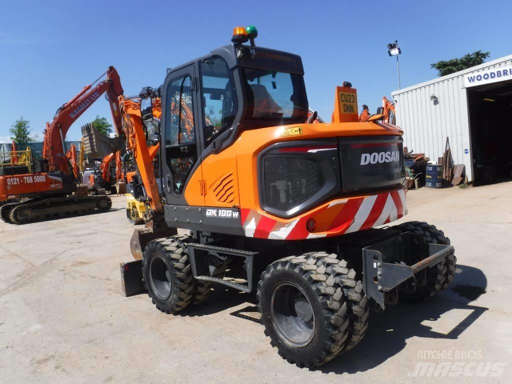 Doosan DX 100W-7 حفارات بعجل