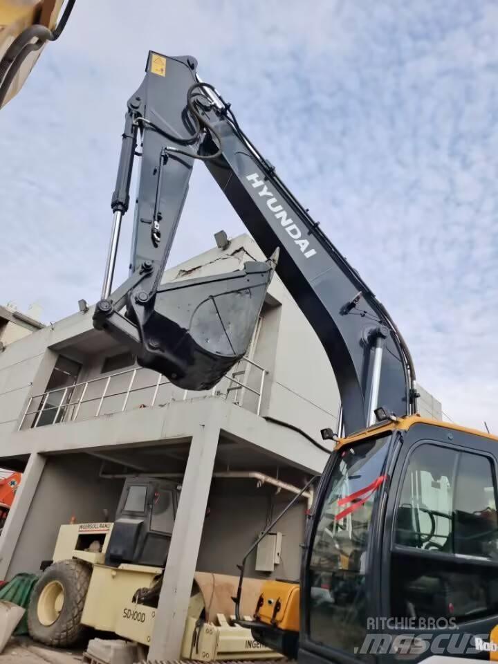 Hyundai 210w-9 حفارات بعجل