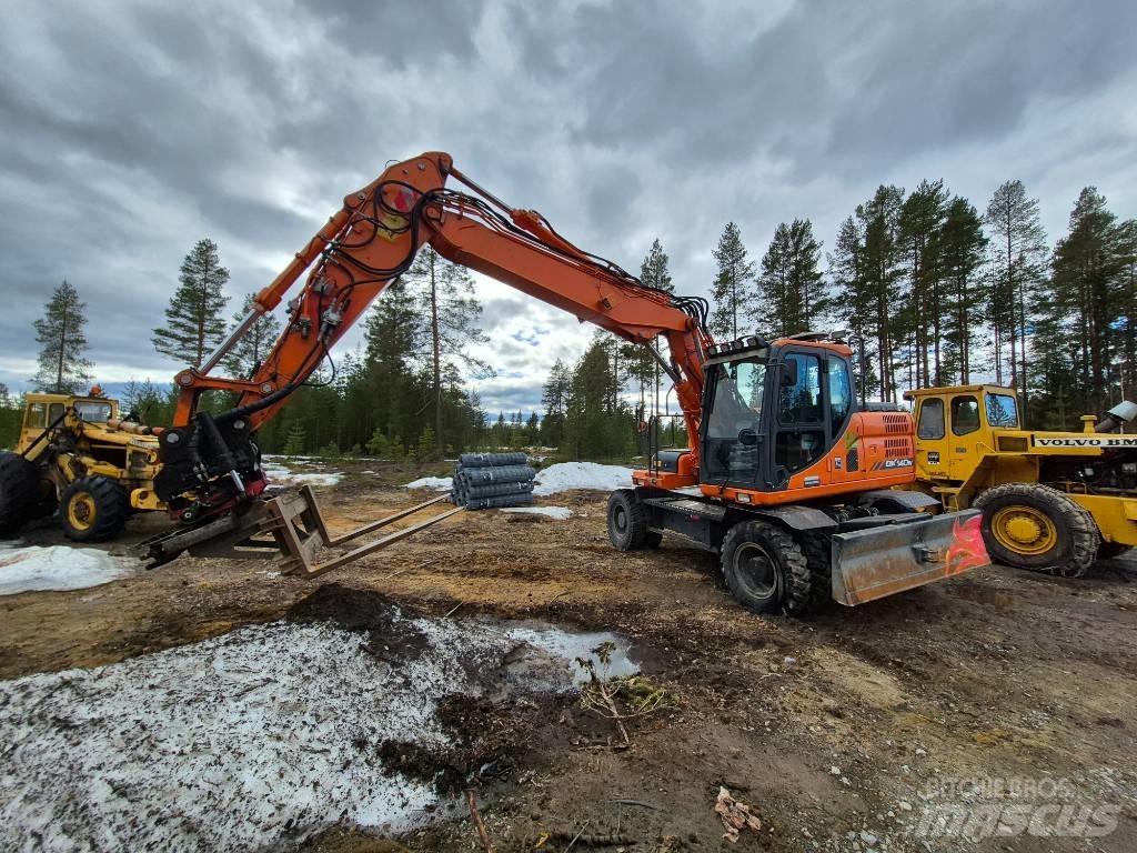 Doosan DX 140 W-3 حفارات بعجل