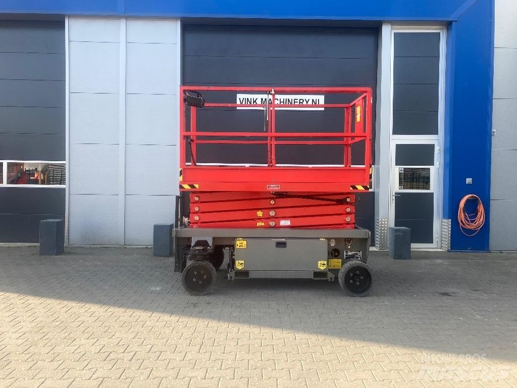 Holland Lift HL 9714 رافعات مقصية الشكل