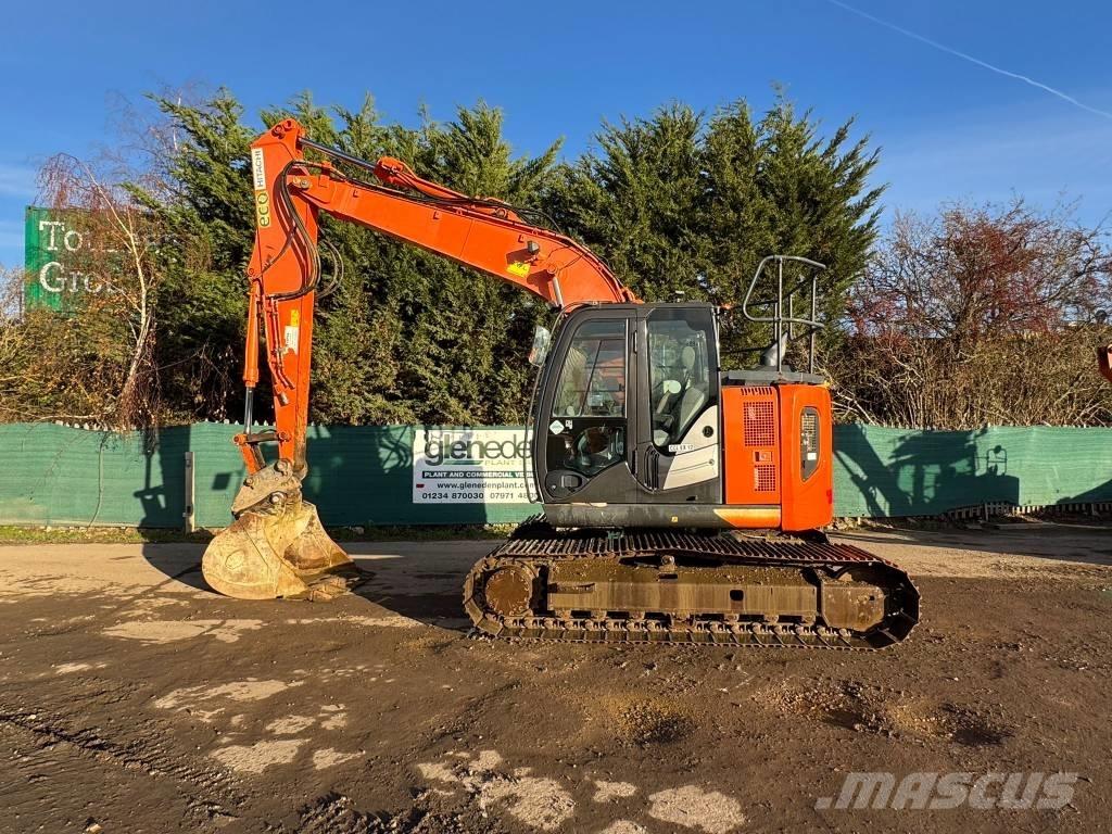 Hitachi ZX 135 US-6 حفارات زحافة