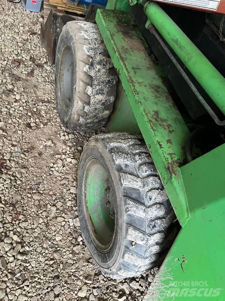 Gehl SL3825 لوادر انزلاقية التوجيه