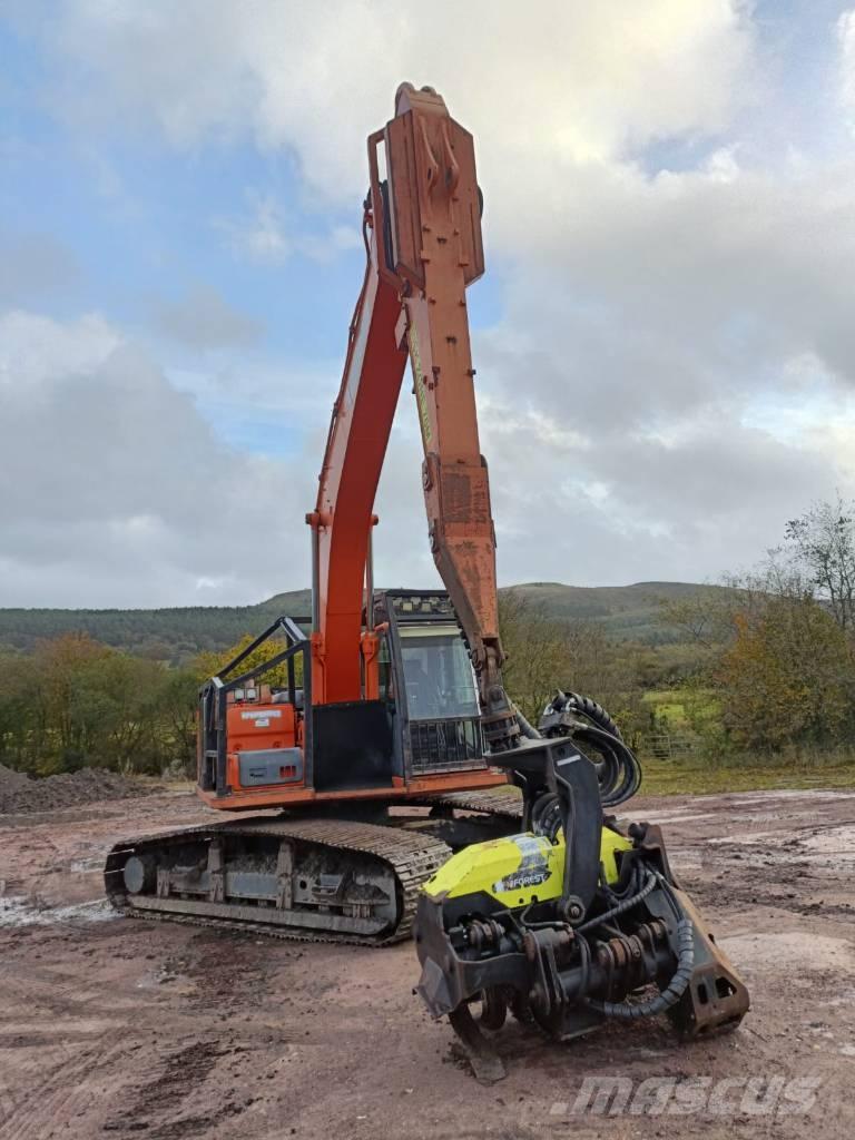 Doosan DX225 حصادات