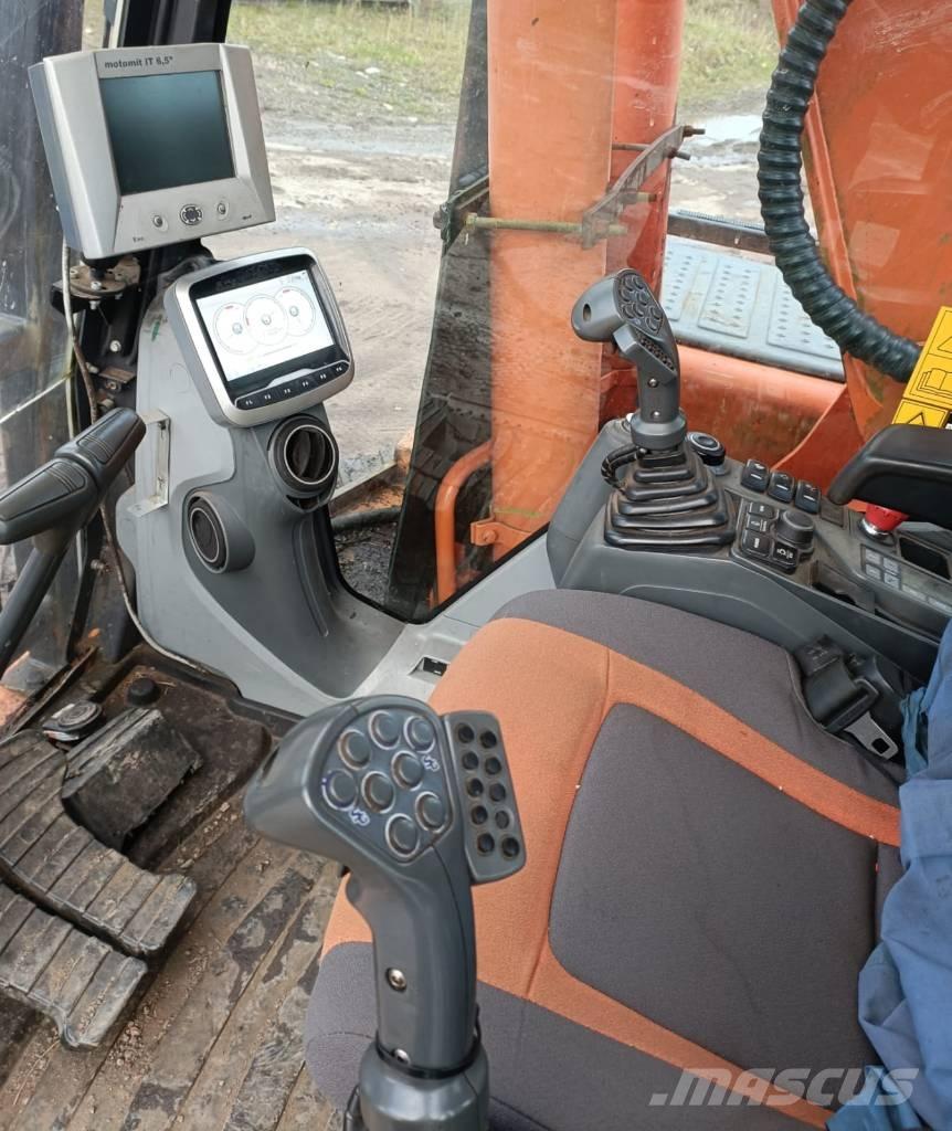 Doosan DX225 حصادات