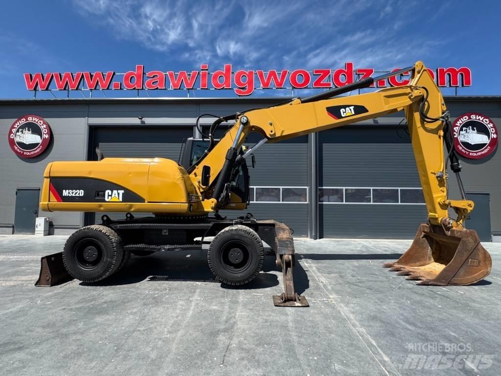 CAT M 322 D حفارات بعجل