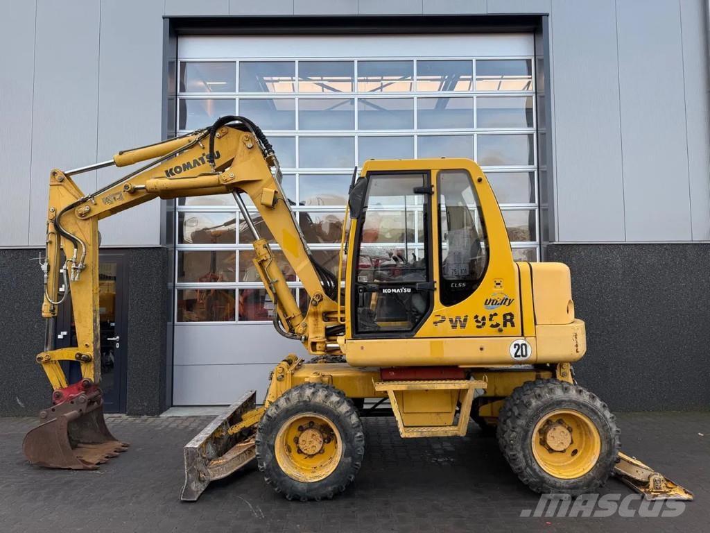 Komatsu PW95 حفارات وسط 7 طن - 12 طن