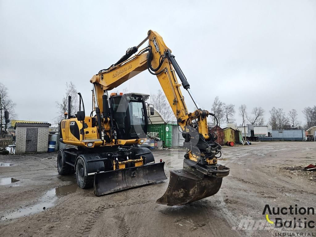 JCB JS 145 W حفارات بعجل