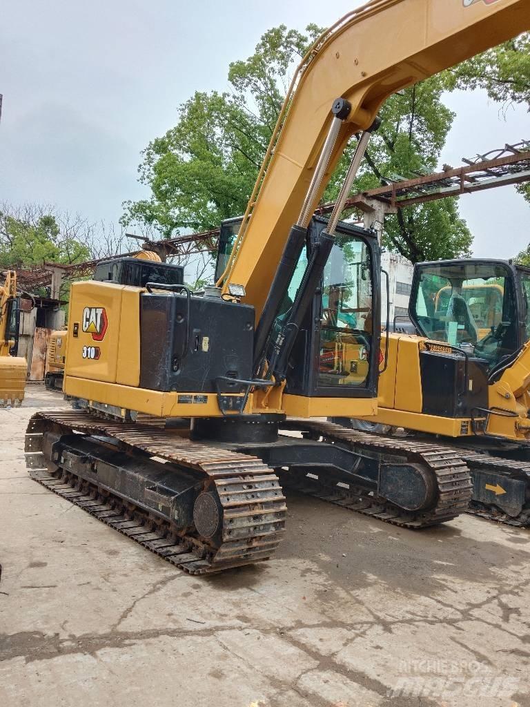 CAT 310 حفارات زحافة