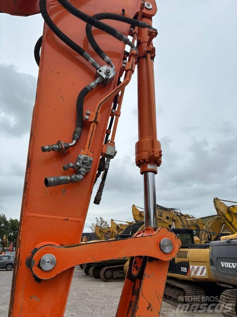 Doosan DX 190 W حفارات بعجل