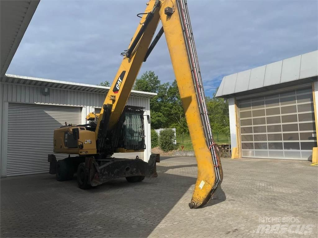 CAT MH3026 حفارات بعجل