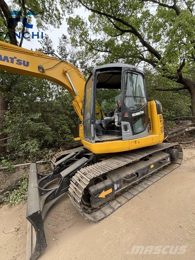 Komatsu PC 128 US حفارات زحافة