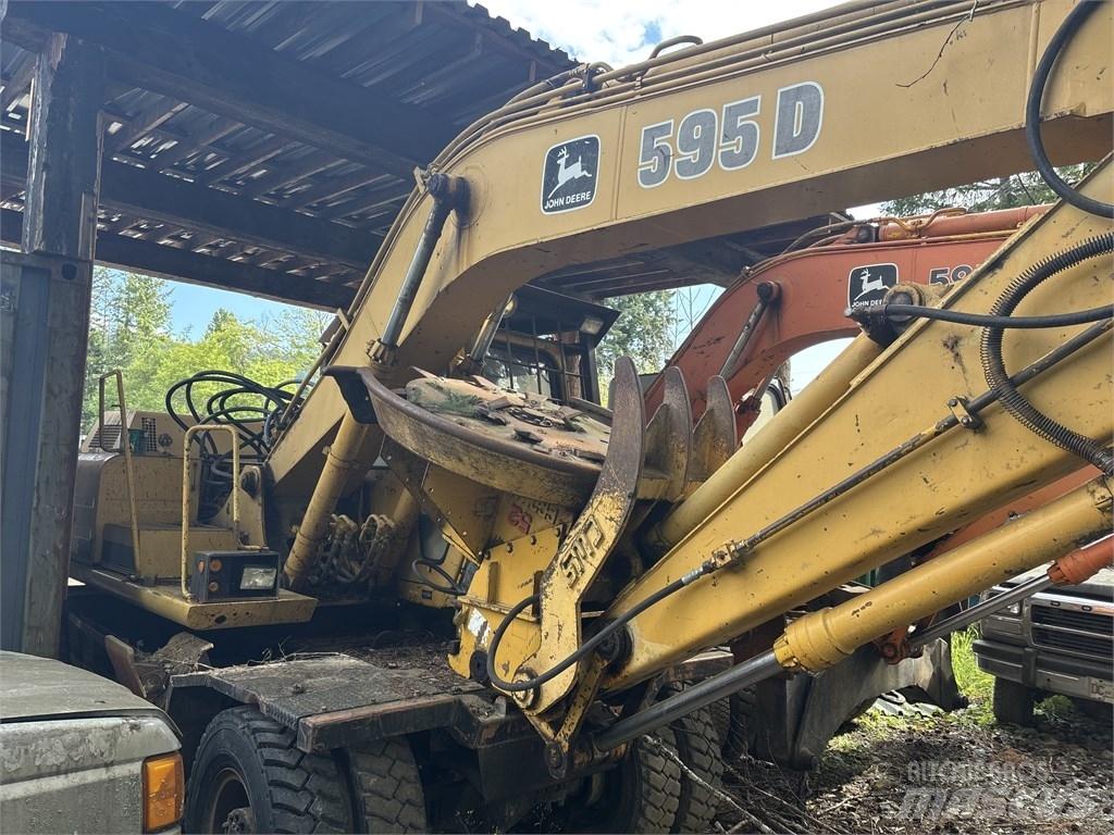 DEERE 595D حفارات بعجل
