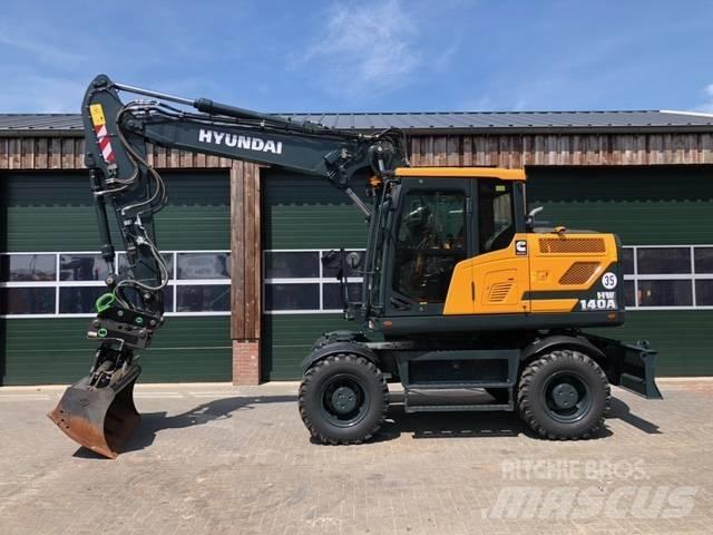 Hyundai HW 140 A حفارات بعجل