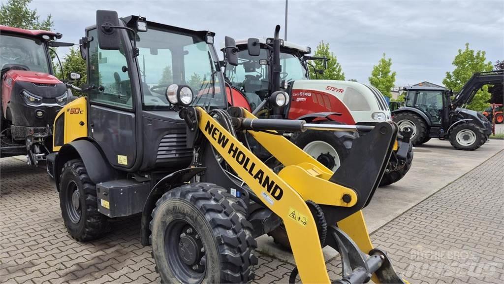 New Holland W 60 C لوادر بعجل