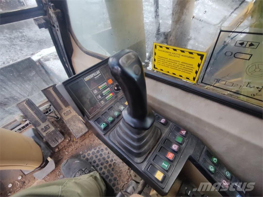 CAT M315 حفارات بعجل