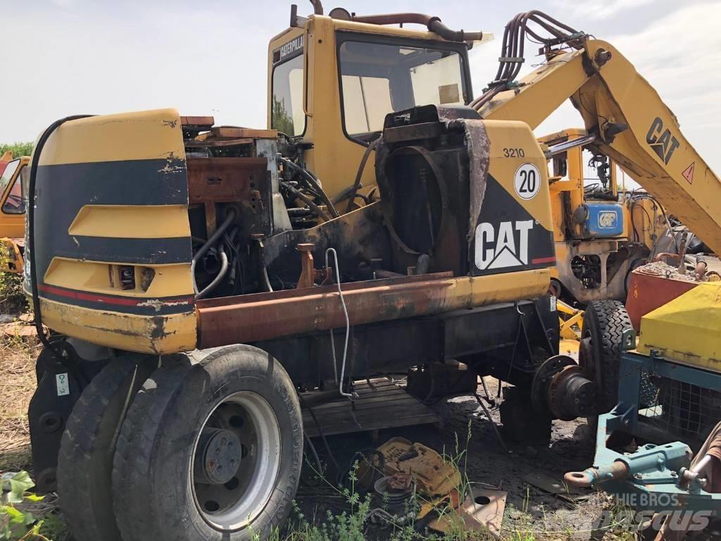 CAT M 312 FOR PARTS حفارات بعجل