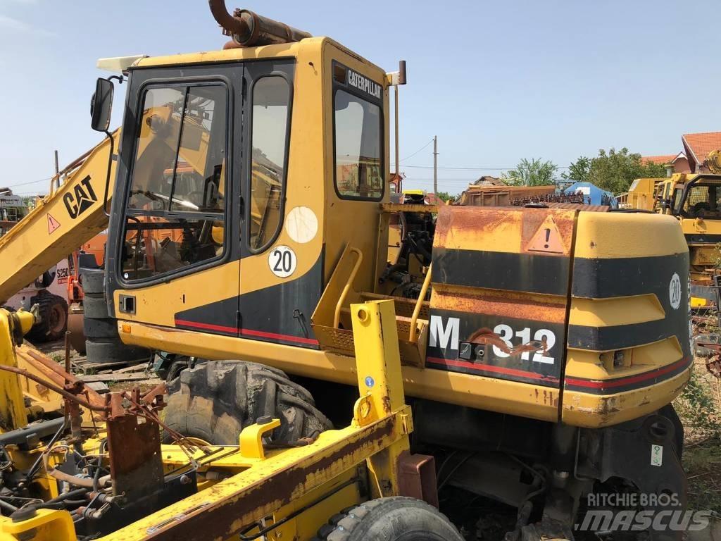 CAT M 312 FOR PARTS حفارات بعجل