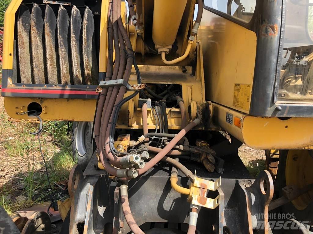 CAT M 312 FOR PARTS حفارات بعجل