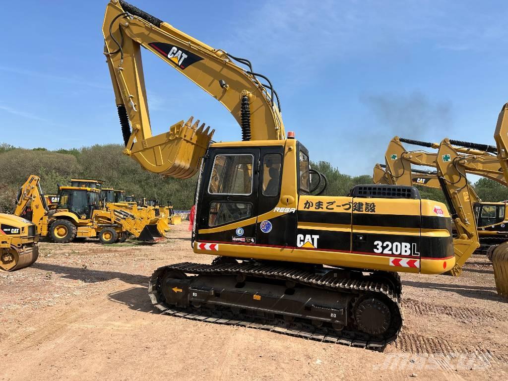 CAT 320 B L حفارات زحافة
