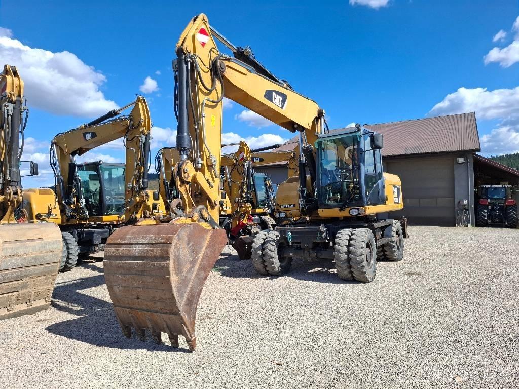 CAT 318 حفارات بعجل